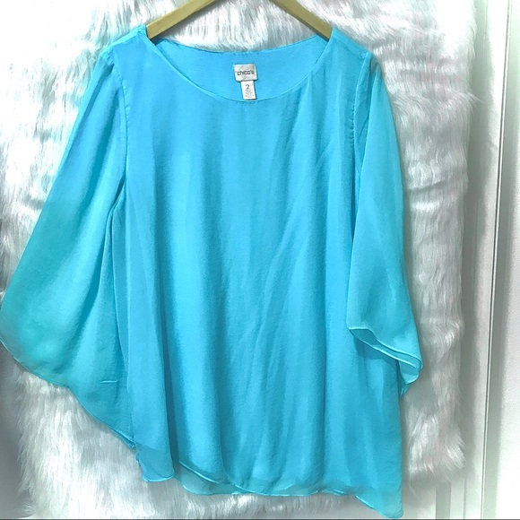 Chico's Tops - CHICO’S LIGHT BLUE ASYMMETRICAL BLOUSE